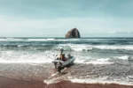 Dory boat fishing in Pacific City 🎣 

Launch straight from the beach and into a one of a kind Oregon Coast tradition. 🌊🎣 Dory boat fishing at Cape Kiwanda isn’t just an adventure; it’s history in motion. 
🐟 Want in? Book a charter and ride with the Dorymen. 🔗 Guide in bio.
#thepeoplescoast